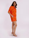 Orange printed co-ord set with balloon sleeves and elasticated shorts