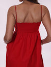 Smocked back of the red poplin dress with pockets