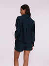 Back view of women's denim co-ord set